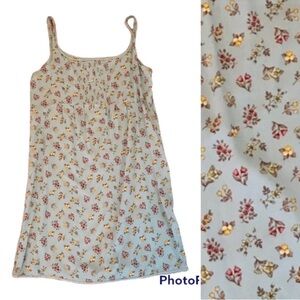 Free People light blue floral dress with pleating at neckline.